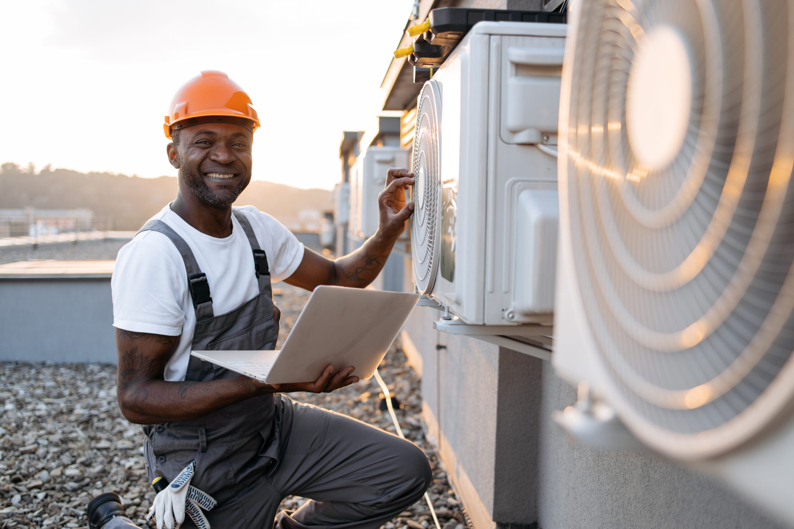 man repairing device for cooling with laptop in ha 2023 12 21 22 01 44 utc scaled